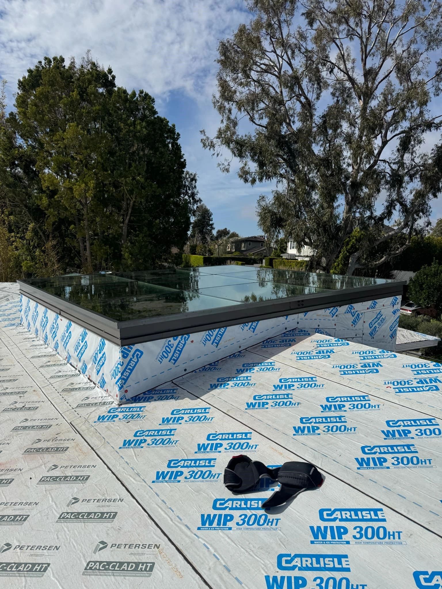 Skylight installation with Carlisle WIP 300HT waterproofing membrane — after